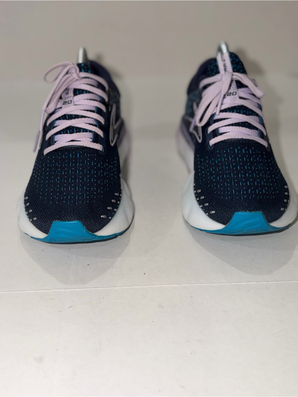 Brooks Navy Athletic Sneakers with Pink Laces and Teal Accents